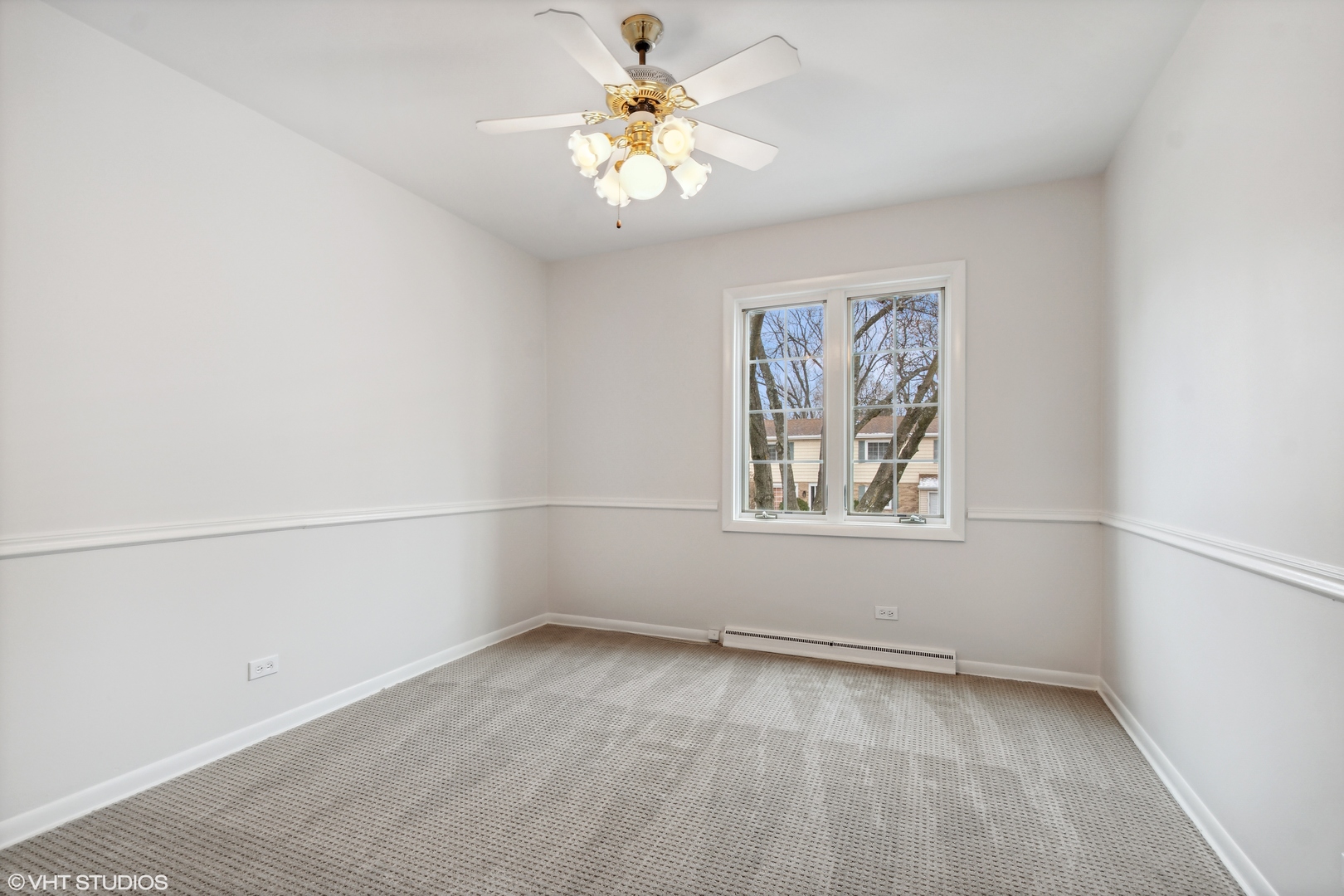 36 Forestway Drive Deerfield, IL 60015 - Photo 23 of 37 an empty room with a window and a fan