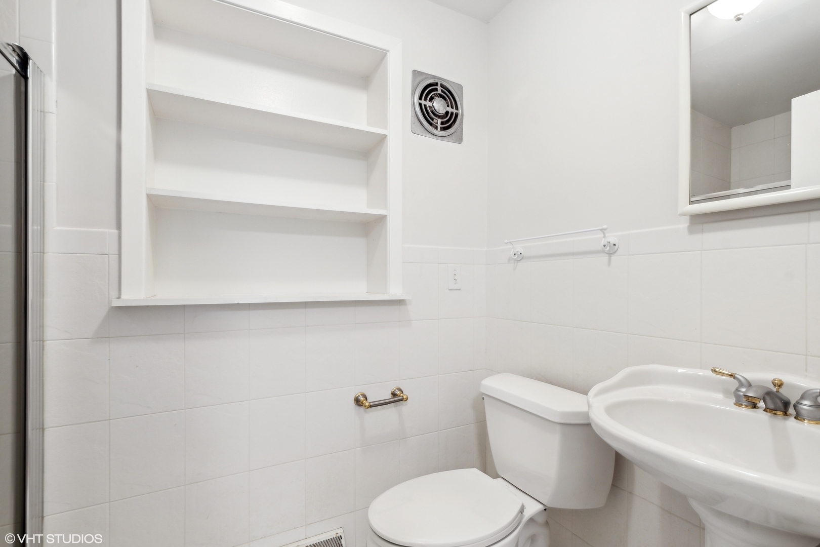 36 Forestway Drive Deerfield, IL 60015 - Photo 25 of 37 a white toilet sitting next to a bathroom sink