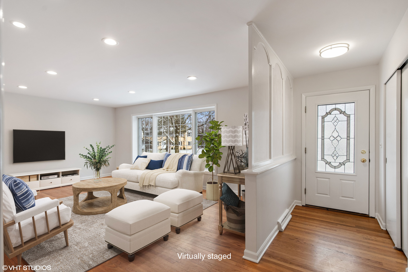 36 Forestway Drive Deerfield, IL 60015 - Photo 3 of 37 a living room with furniture wooden floor and a flat screen tv