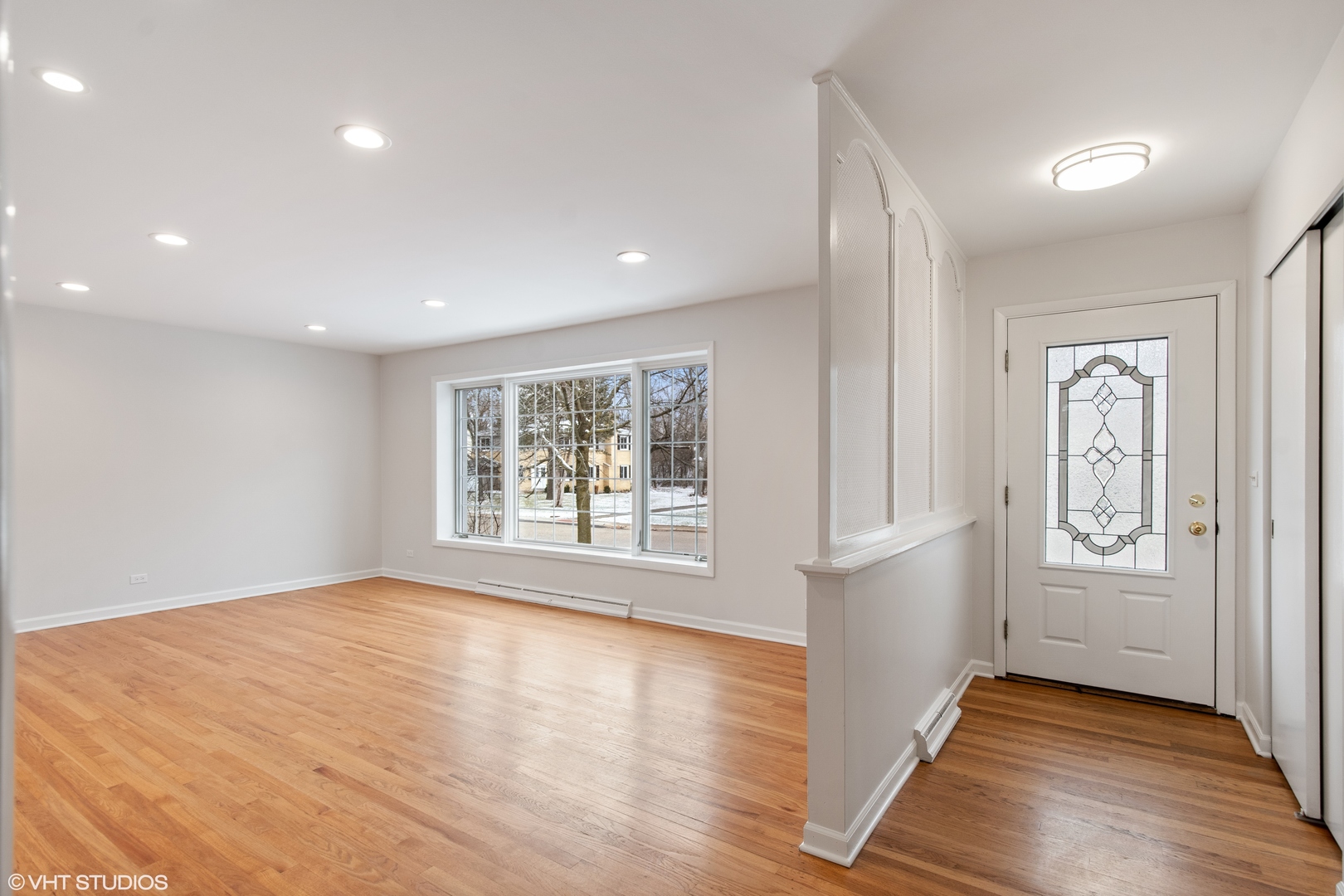 36 Forestway Drive Deerfield, IL 60015 - Photo 4 of 37 a view of an empty room with wooden floor and a window