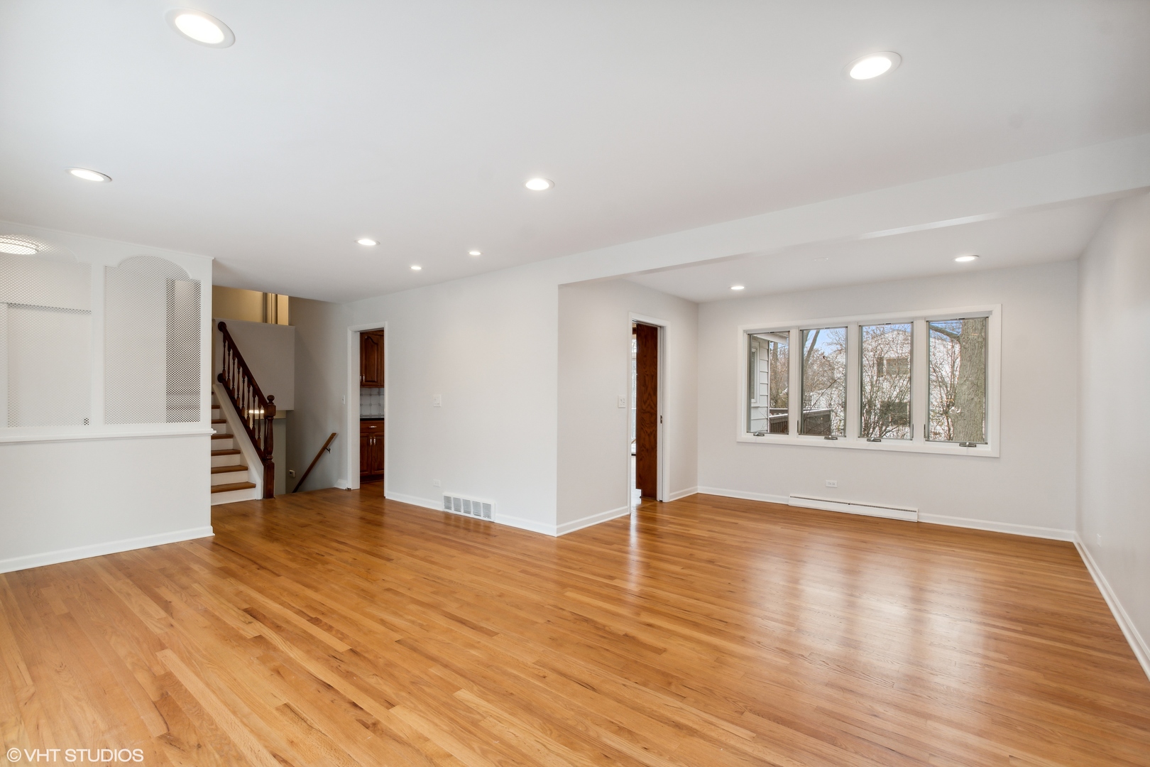 36 Forestway Drive Deerfield, IL 60015 - Photo 8 of 37 a view of an empty room with wooden floor and a window