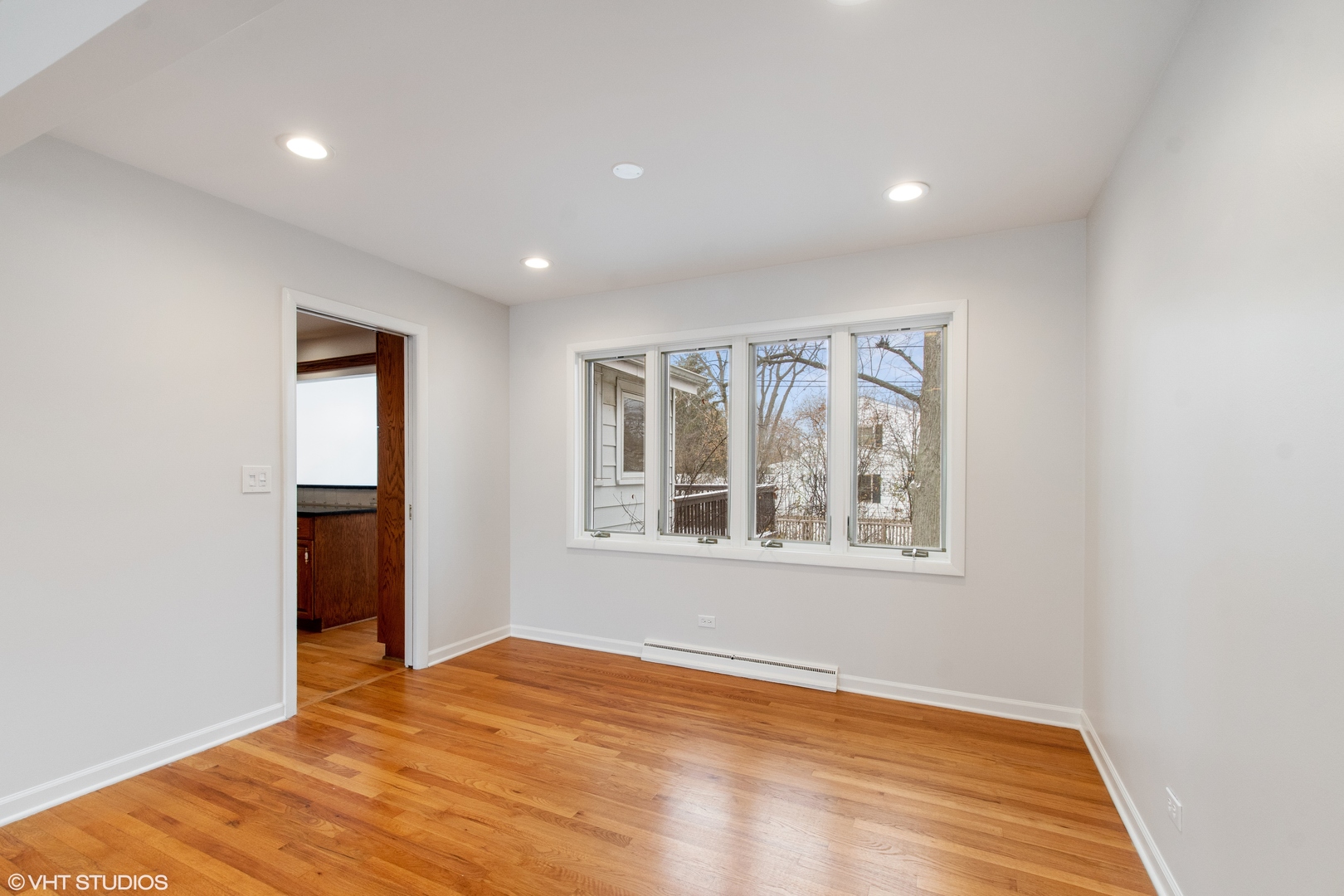 36 Forestway Drive Deerfield, IL 60015 - Photo 9 of 37 a view of an empty room with wooden floor and a window