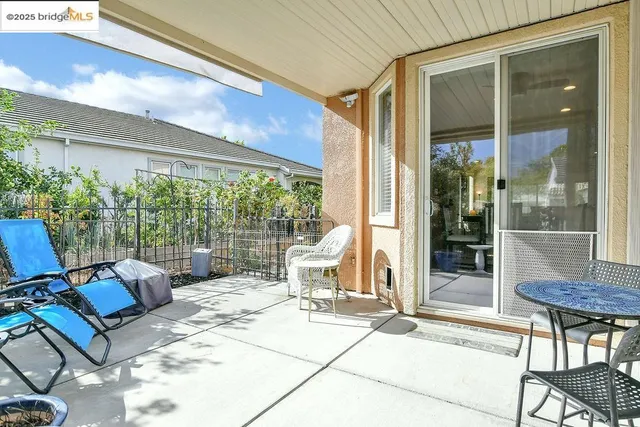 a bathroom with a double vanity sink mirror and shower