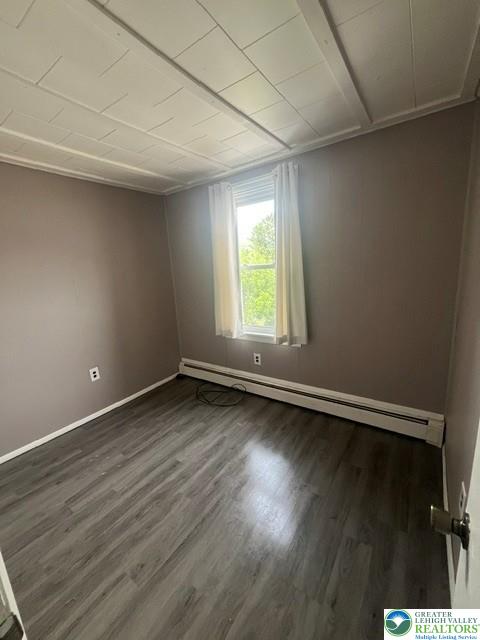 80 West Center Street Nesquehoning, PA 18240 - Photo 2 of 5 Well-lit room with wood-look flooring and a window offering natural light.
