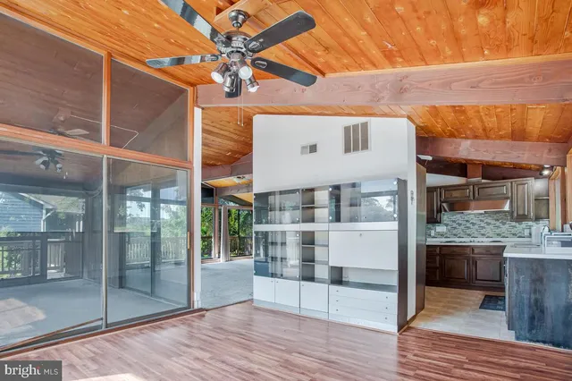 a view of a glass door of the house