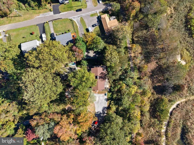 an aerial view of residential building with ocean view