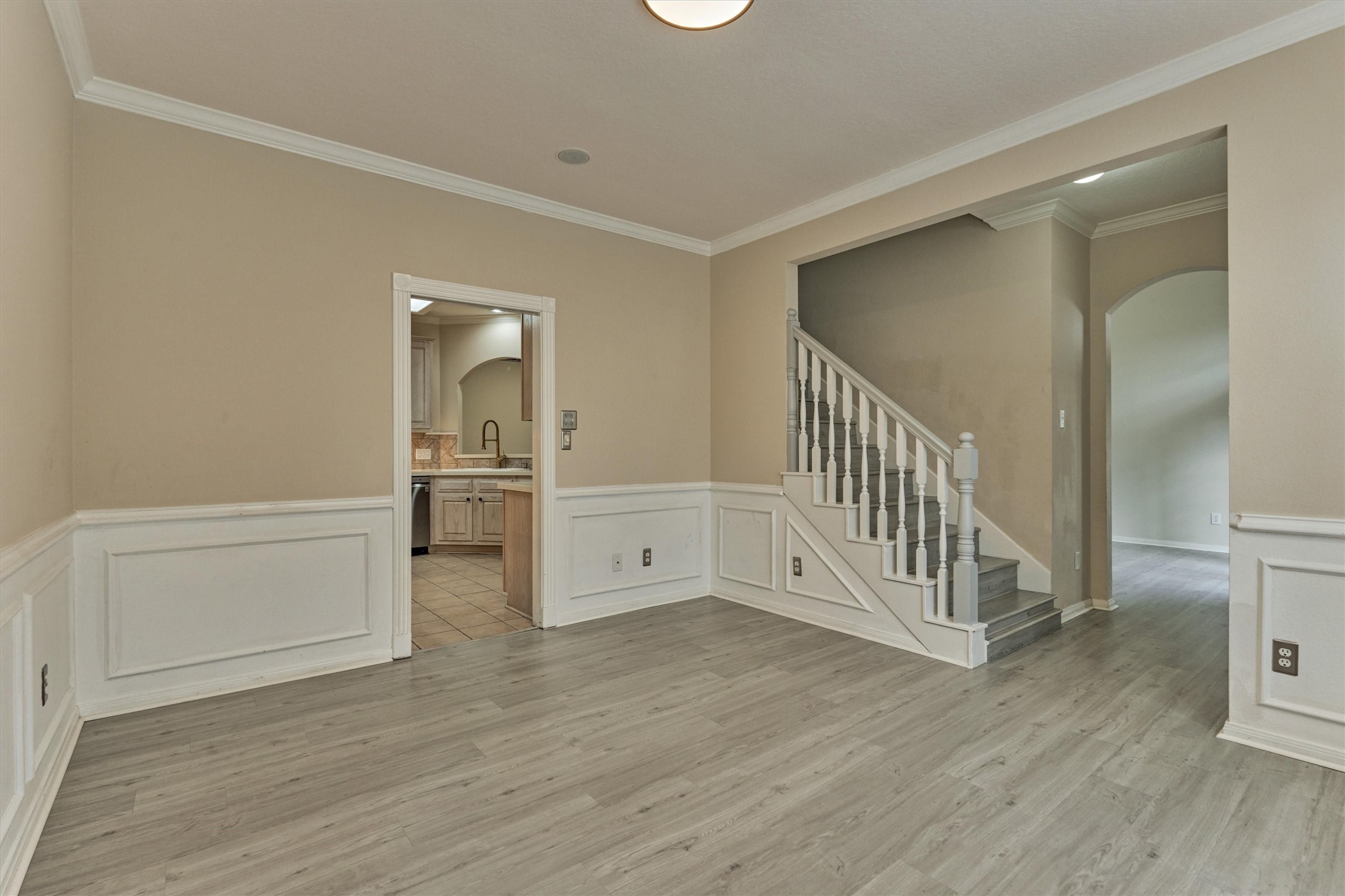 14420 Walters Road, Unit 26 Houston, TX 77014 - Photo 21 of 45 Another view from the formal dining room. Looking into the kitchen and the stairs leading to the gameroom and all bedrooms.