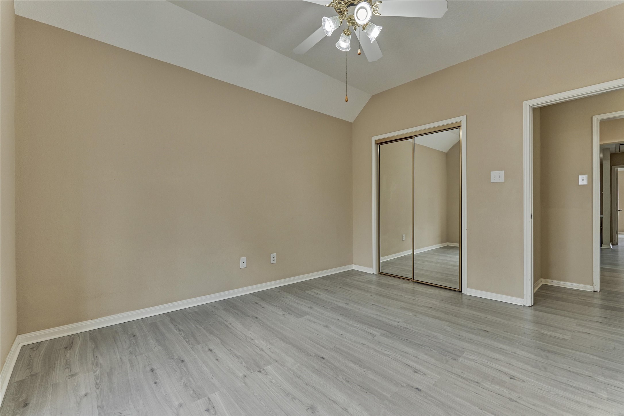 14420 Walters Road, Unit 26 Houston, TX 77014 - Photo 35 of 45 a view of an empty room with wooden floor
