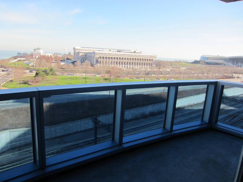Undisclosed Address Chicago, IL 60605 - Photo 17 of 35 a terrace with kitchen view and wooden floor