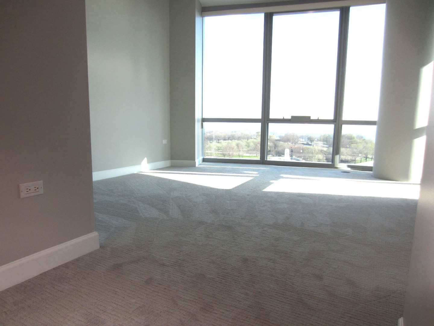 Undisclosed Address Chicago, IL 60605 - Photo 10 of 35 a view of an empty room with a balcony