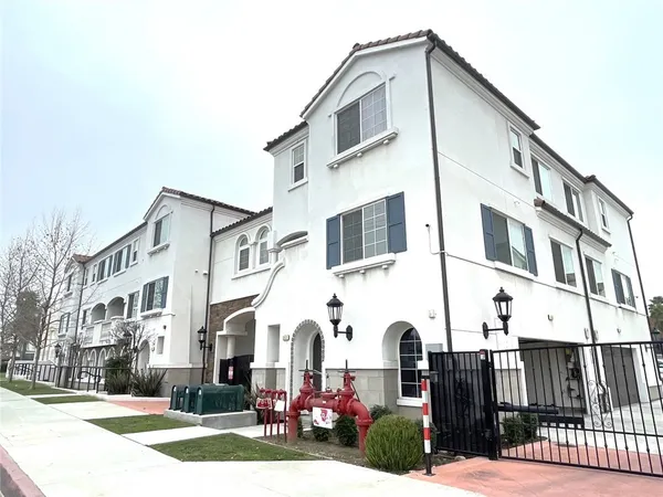 a front view of a large white building