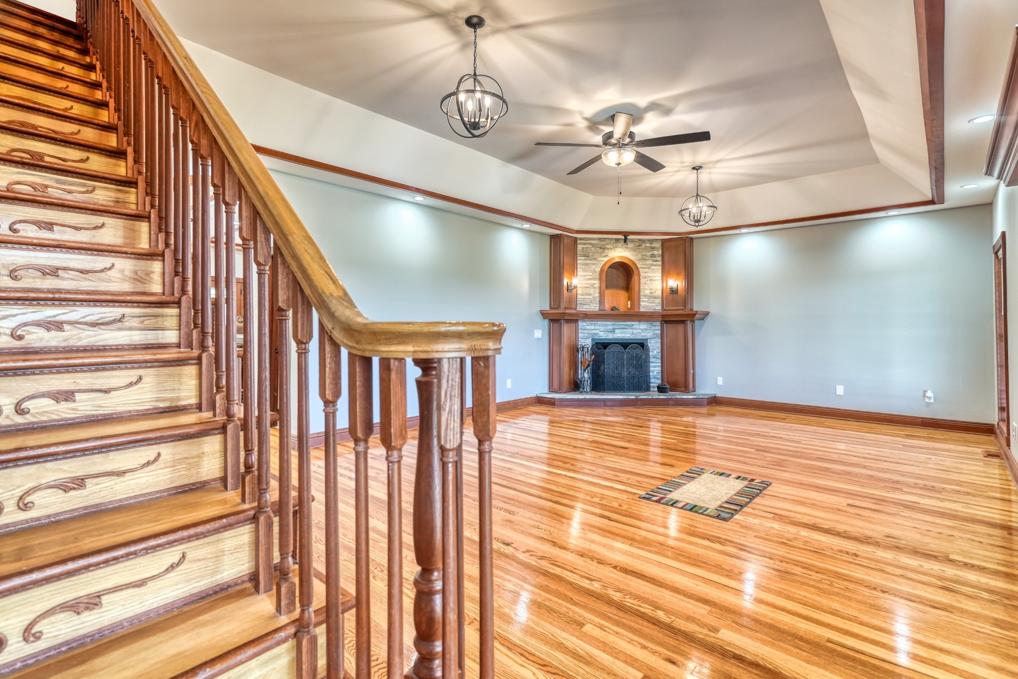 315 Blue And Gray Park Road Elkton, KY 42220 - Photo 20 of 66 a view of an empty room with a fireplace and a chandelier