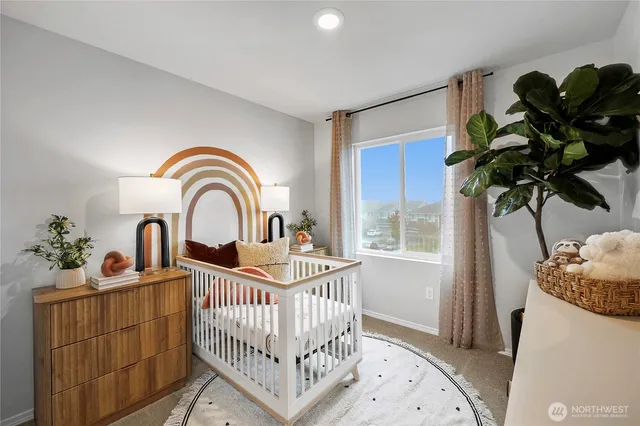 a living room with furniture and a mirror