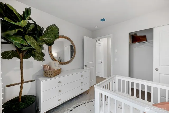 a view of a bedroom with a wardrobe space