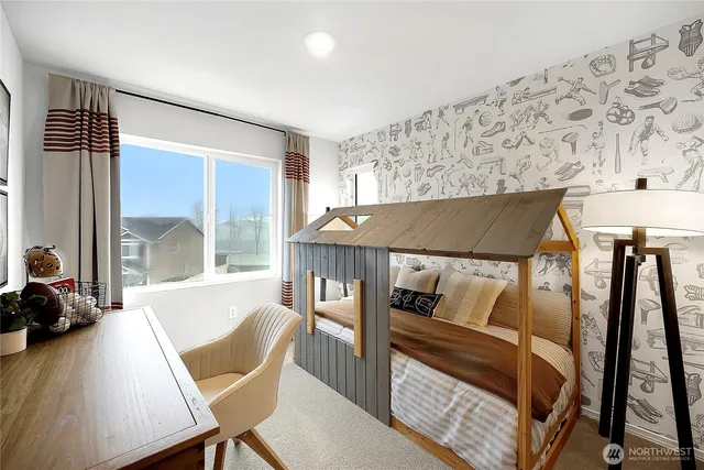 a view of a livingroom with furniture and staircase