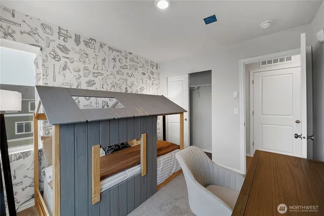 a bathroom with a bathtub and a toilet