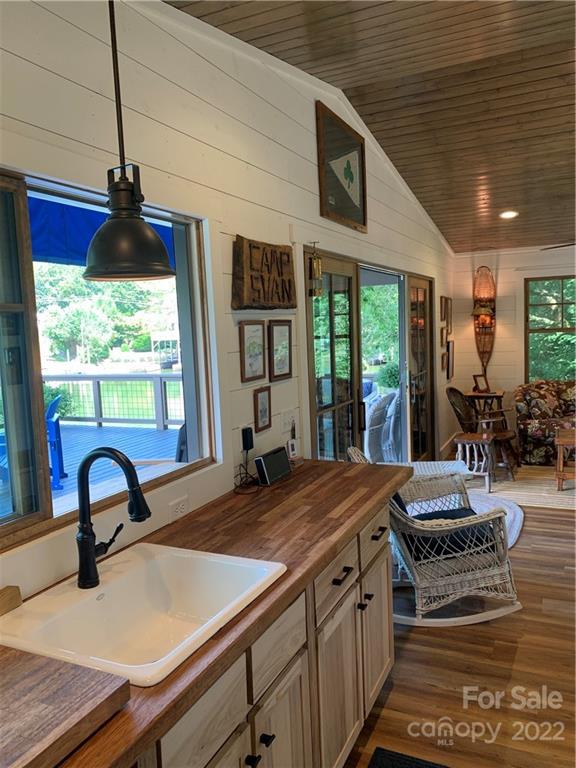 100 North Lake Summit Road Zirconia, NC 28790 - Photo 4 of 10 a kitchen with stainless steel appliances granite countertop sink stove and refrigerator