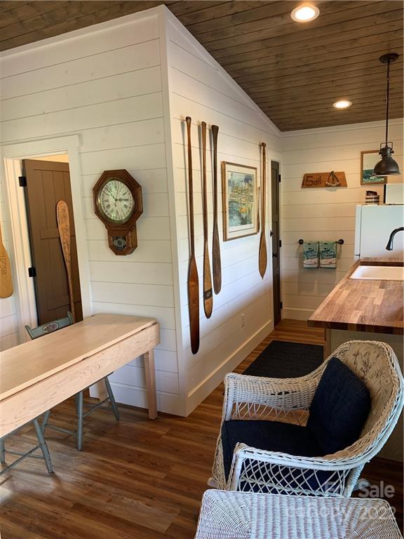 100 North Lake Summit Road Zirconia, NC 28790 - Photo 5 of 10 a living room with furniture and a clock