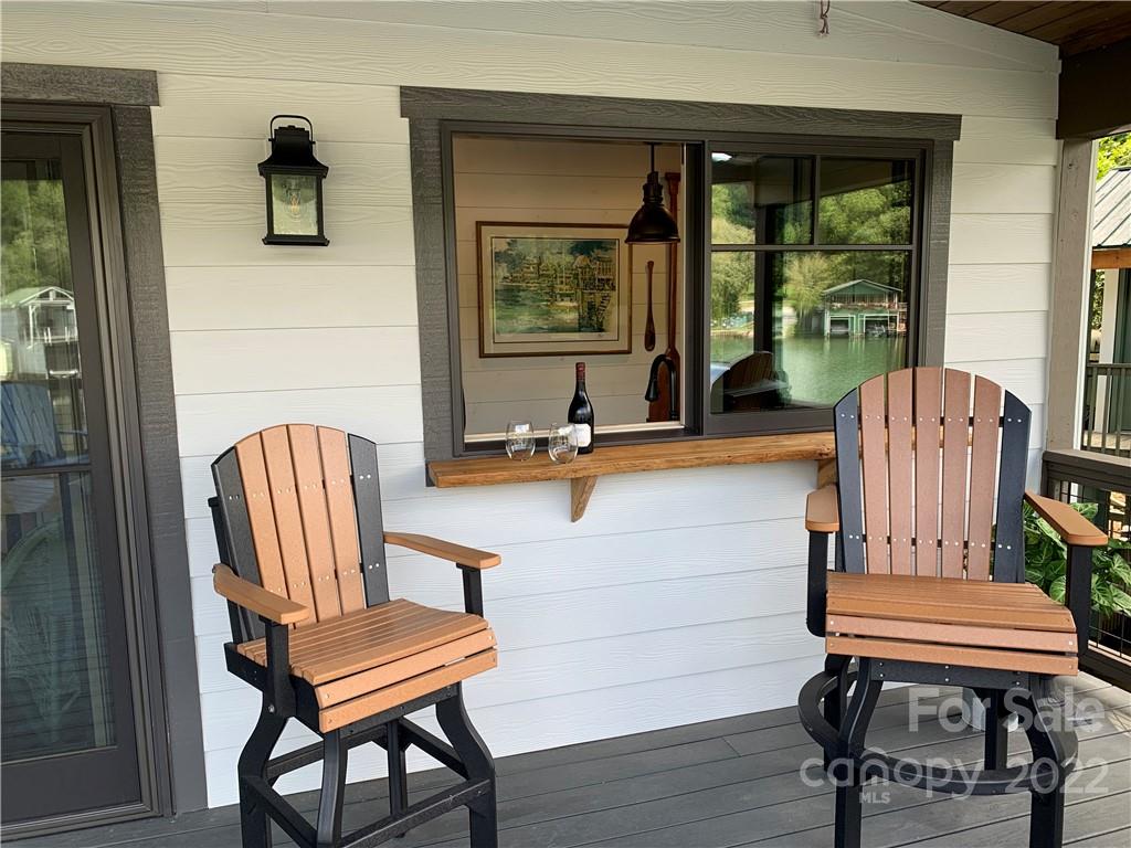 100 North Lake Summit Road Zirconia, NC 28790 - Photo 6 of 10 a living room with furniture and a window
