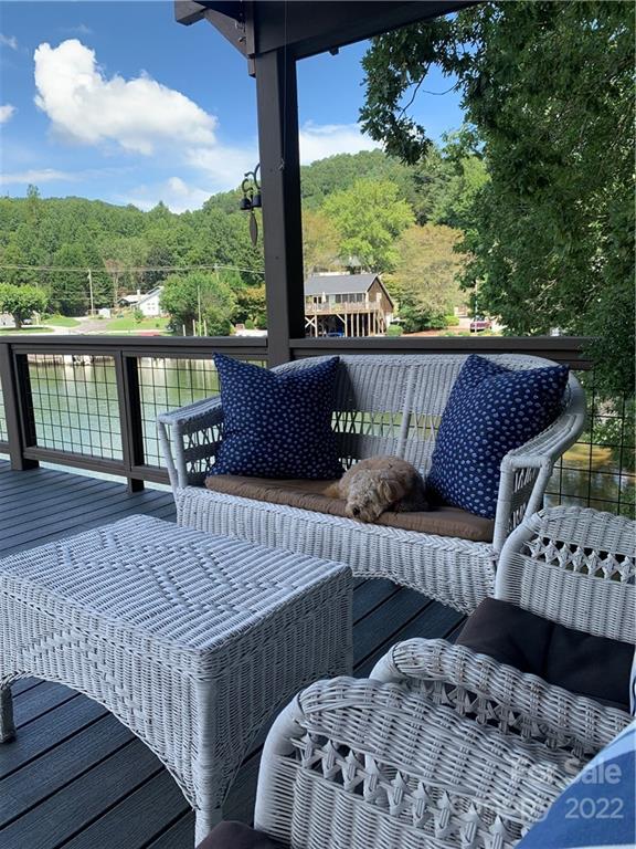 100 North Lake Summit Road Zirconia, NC 28790 - Photo 7 of 10 a view of a two chairs in the deck