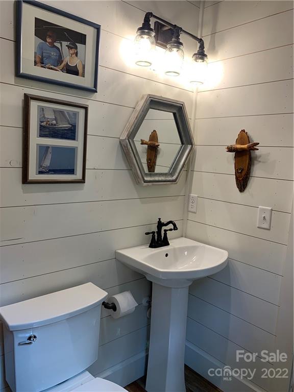 100 North Lake Summit Road Zirconia, NC 28790 - Photo 8 of 10 a bathroom with a sink and a mirror