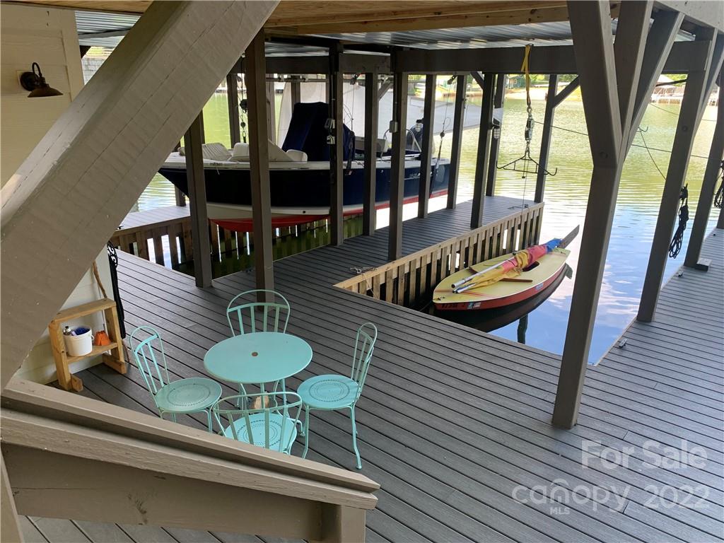 100 North Lake Summit Road Zirconia, NC 28790 - Photo 10 of 10 a dining room with furniture and wooden floor