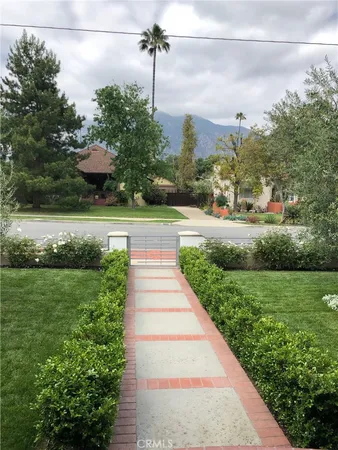 a view of a garden with a pathway