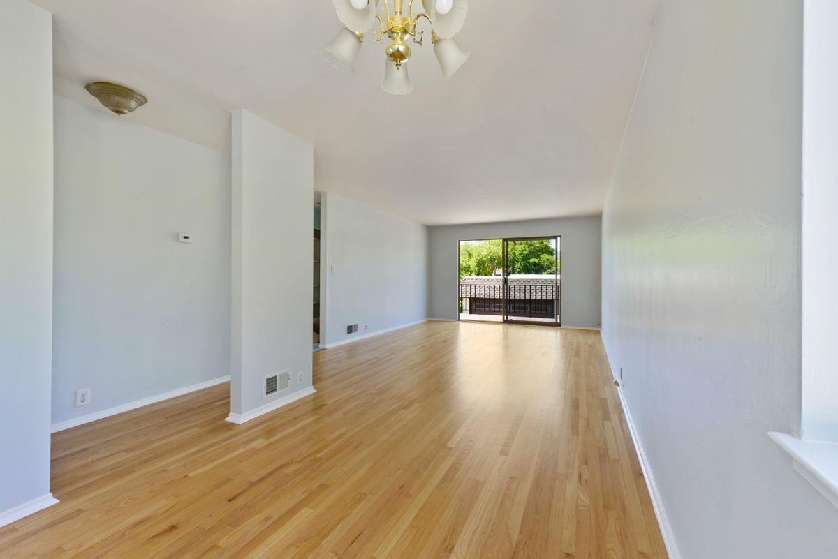 41 15th Avenue San Mateo, CA 94402 - Photo 4 of 11 a view of empty room with wooden floor