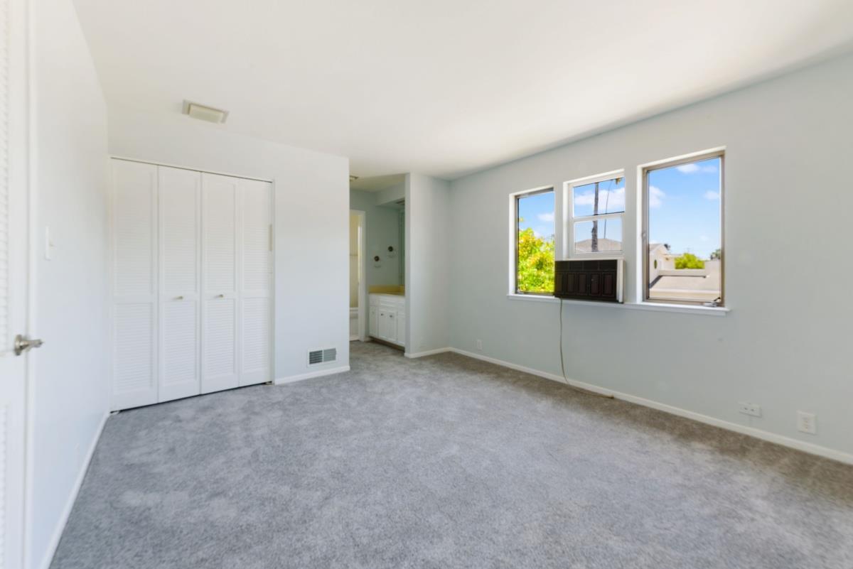 41 15th Avenue San Mateo, CA 94402 - Photo 8 of 11 an empty room with window and wooden floor