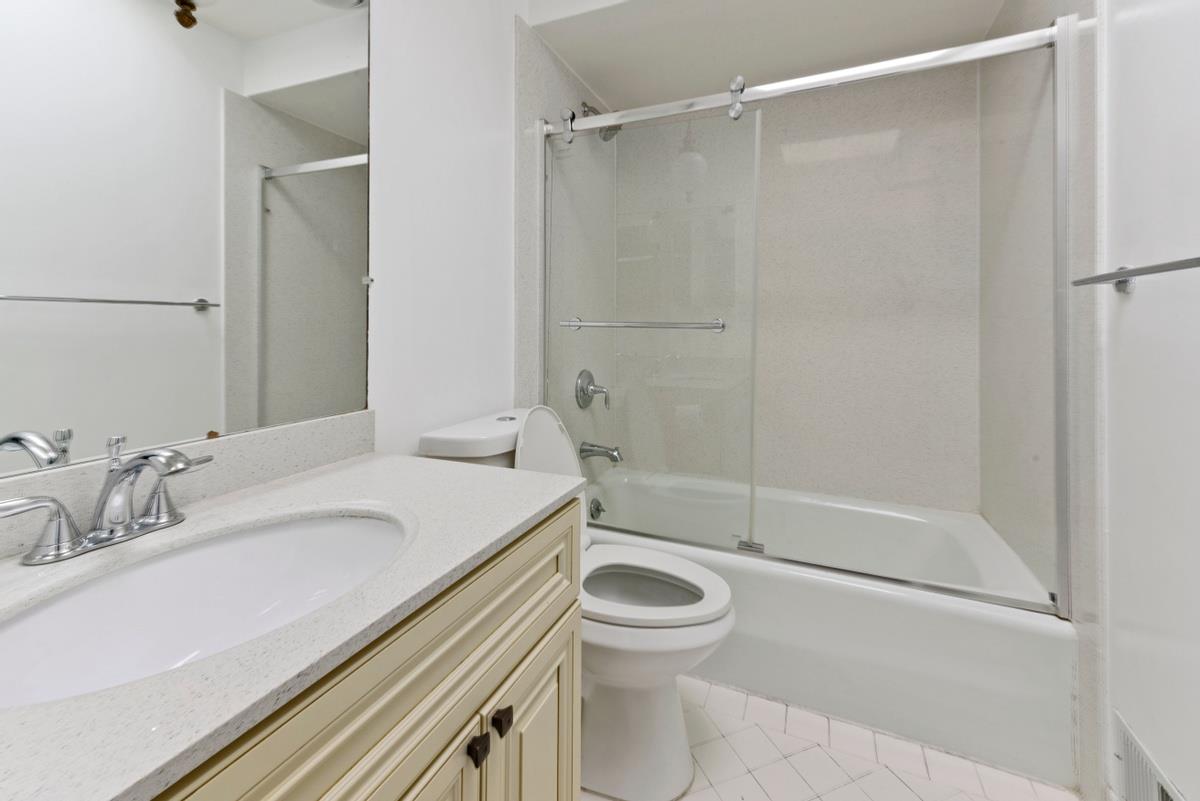 41 15th Avenue San Mateo, CA 94402 - Photo 9 of 11 a bathroom with a sink a toilet and shower