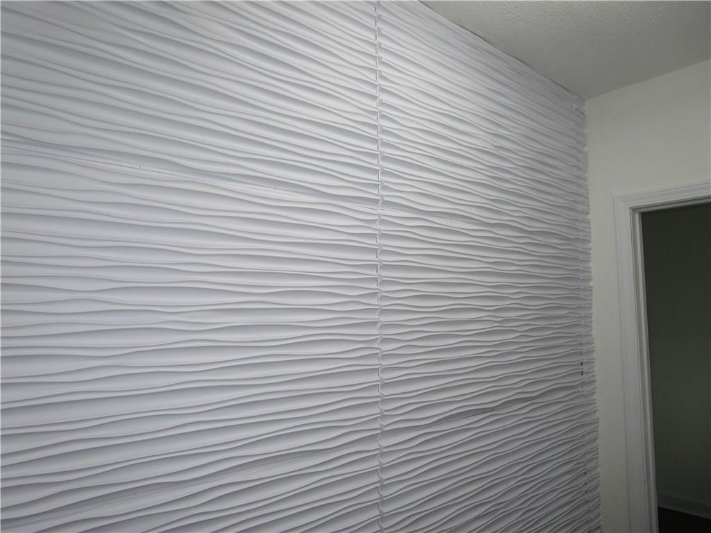 411 Emerson Avenue Farrell, PA 16121 - Photo 25 of 25 a view of a room with a wooden wall