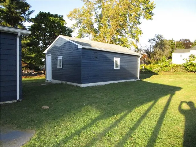 a view of an house with backyard