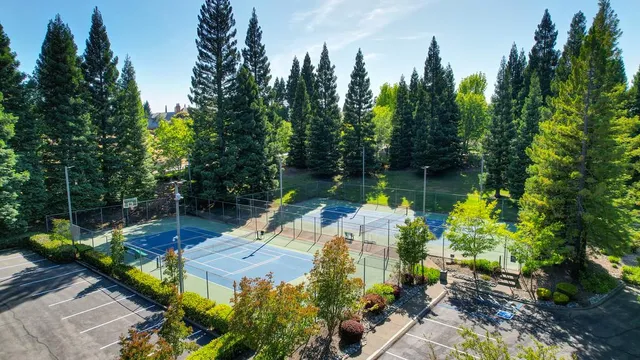 a view of a lake with a house in the background