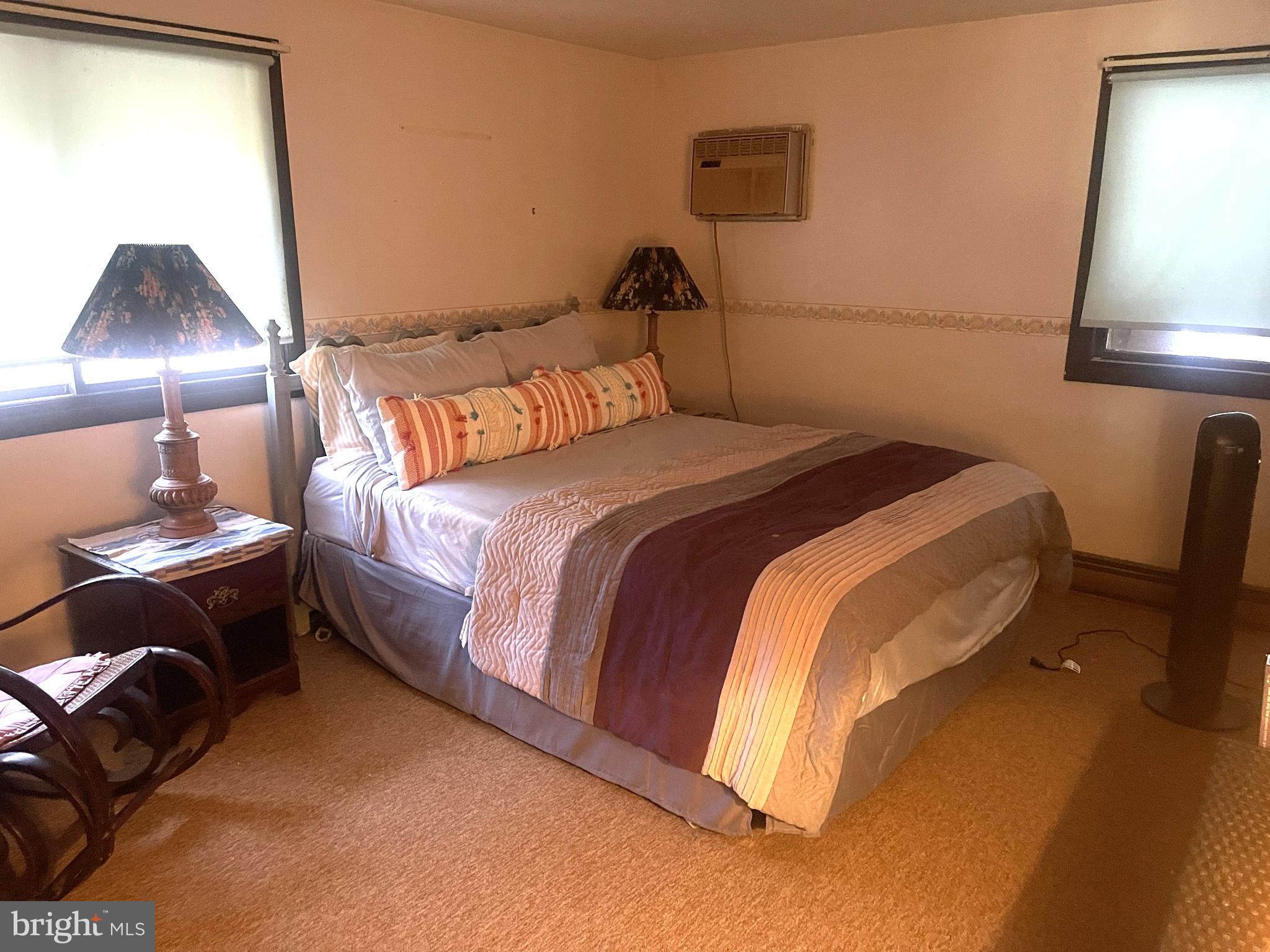 272 North Glebe Road Montross, VA 22520 - Photo 12 of 20 a bedroom with a bed and a lamp