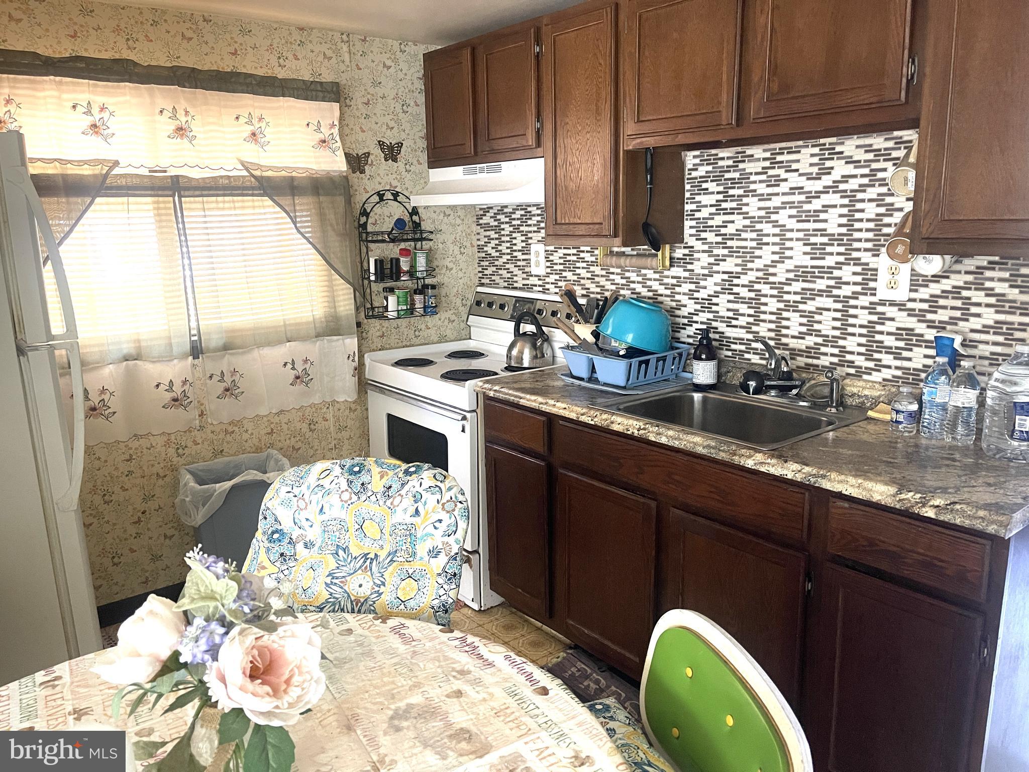 272 North Glebe Road Montross, VA 22520 - Photo 14 of 20 a kitchen with a sink appliances and cabinets