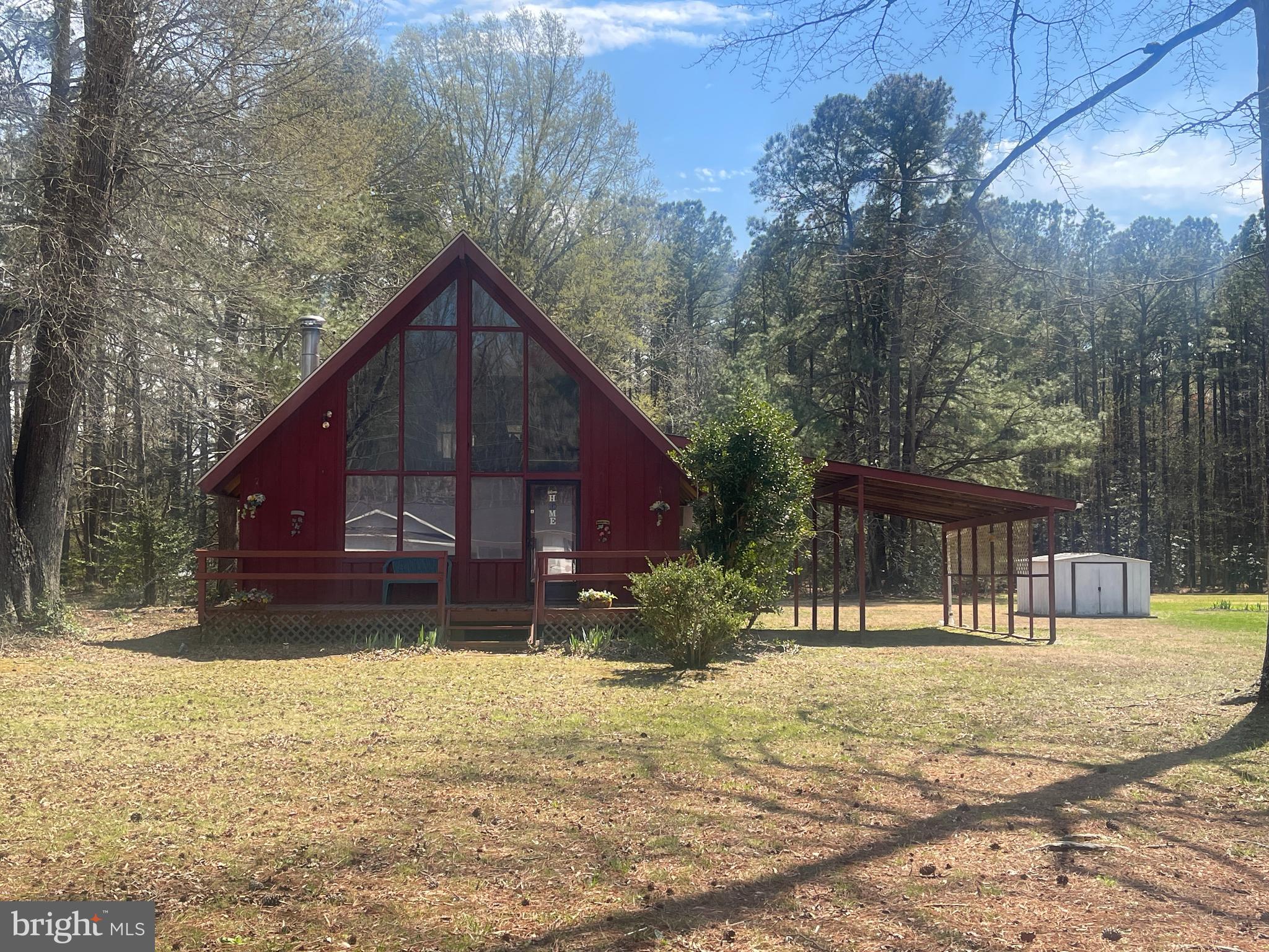 272 North Glebe Road Montross, VA 22520 - Photo 5 of 20 a view of a house with a yard covered in snow