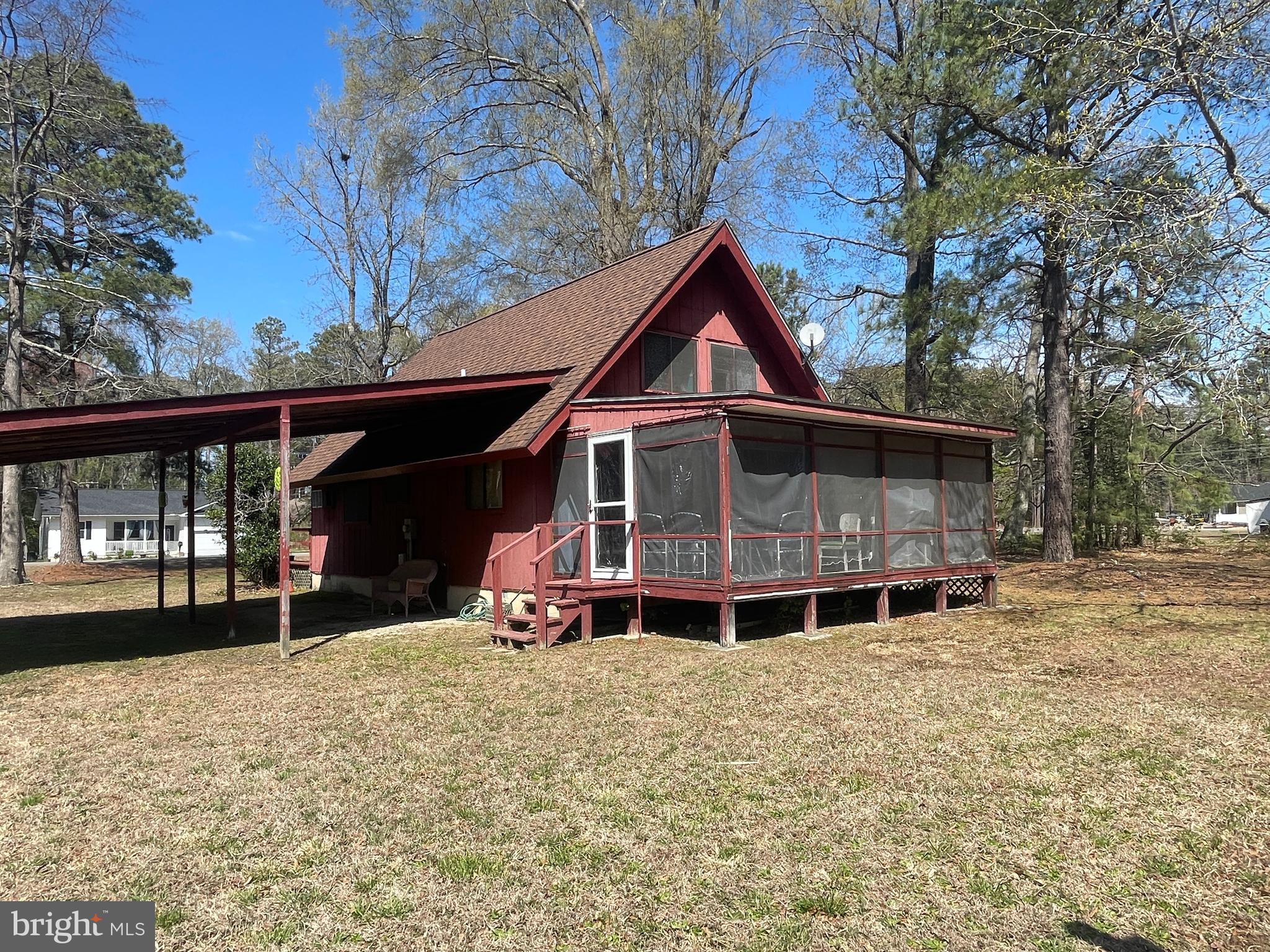 272 North Glebe Road Montross, VA 22520 - Photo 7 of 20 a front view of a house with a garden and trees