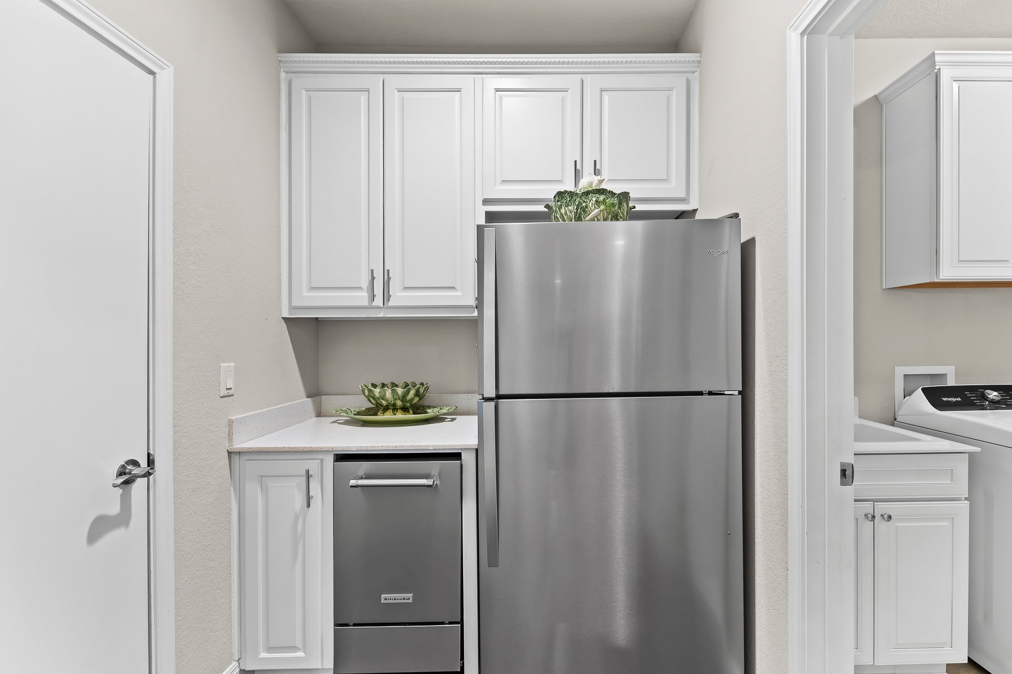 104 Marfa Cove Georgetown, TX 78633 - Photo 20 of 40 Butler's pantry with fridge and built-in icemaker