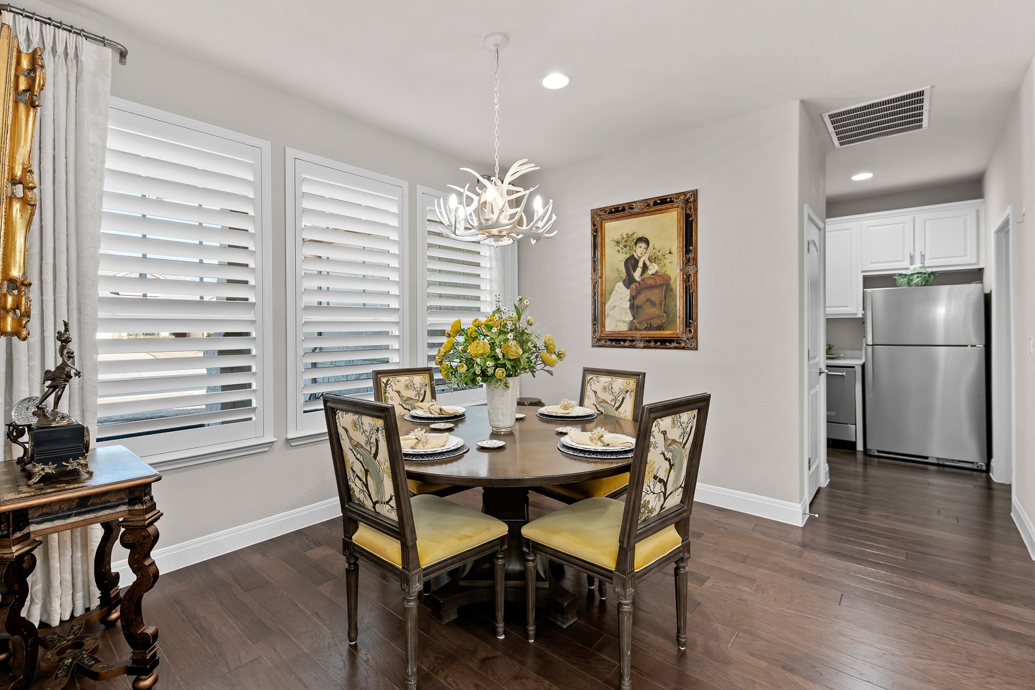 104 Marfa Cove Georgetown, TX 78633 - Photo 21 of 40 Sunlit breakfast room with another designer light fixture
