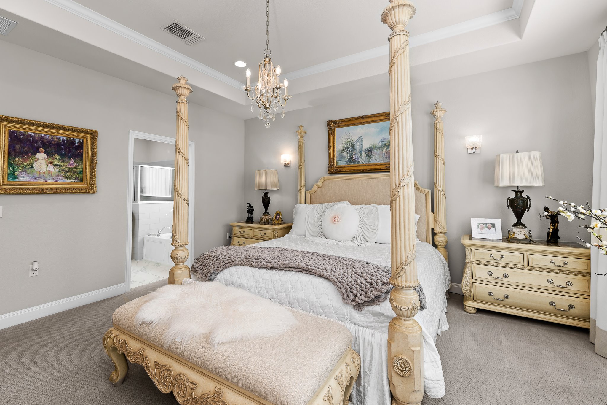 104 Marfa Cove Georgetown, TX 78633 - Photo 23 of 40 Primary bedroom leading into bath