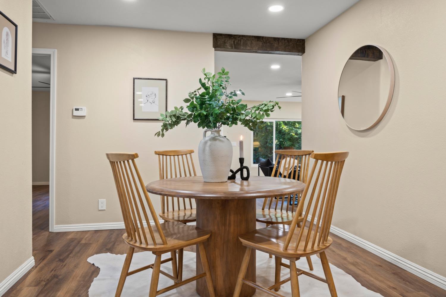 385 Burnham Road Oak View, CA 93022 - Photo 4 of 25 a view of a dining room with furniture and wooden floor