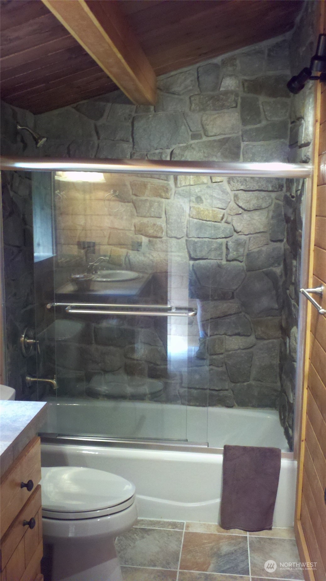 51614 South Riverside Road Gold Bar, WA 98251 - Photo 34 of 37 a bathroom with a shower and toilet