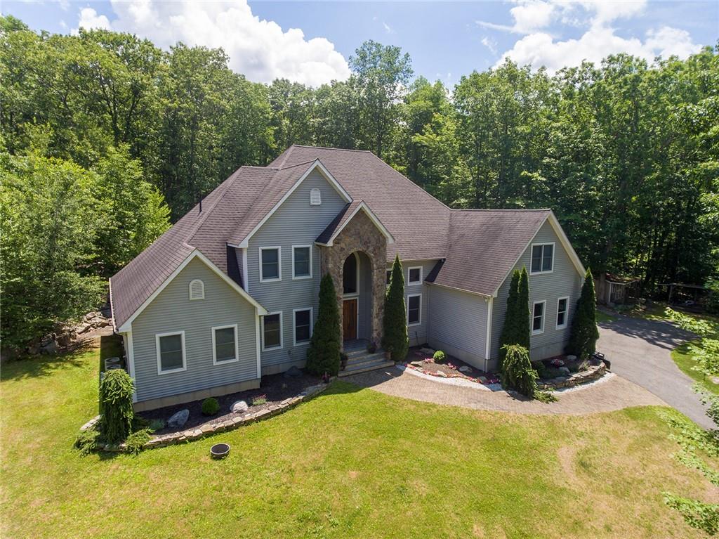 175 Alexander Road Monroe, NY 10950 - Photo 1 of 1 a front view of a house with a yard