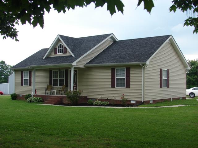 1200 Mt Vernon Road Bethpage, TN 37022 - Photo 10 of 12 a front view of a house with a garden