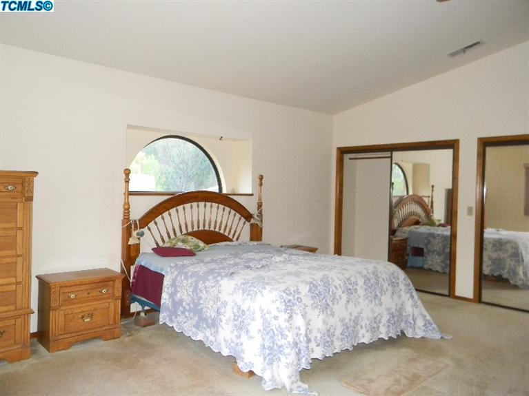 40675 Crystal Drive Three Rivers, CA 93271 - Photo 25 of 34 a bedroom with a bed and dresser