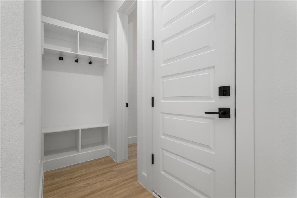 8918 Lowell Street Rowlett, TX 75089 - Photo 17 of 30 a view of walk in closet
