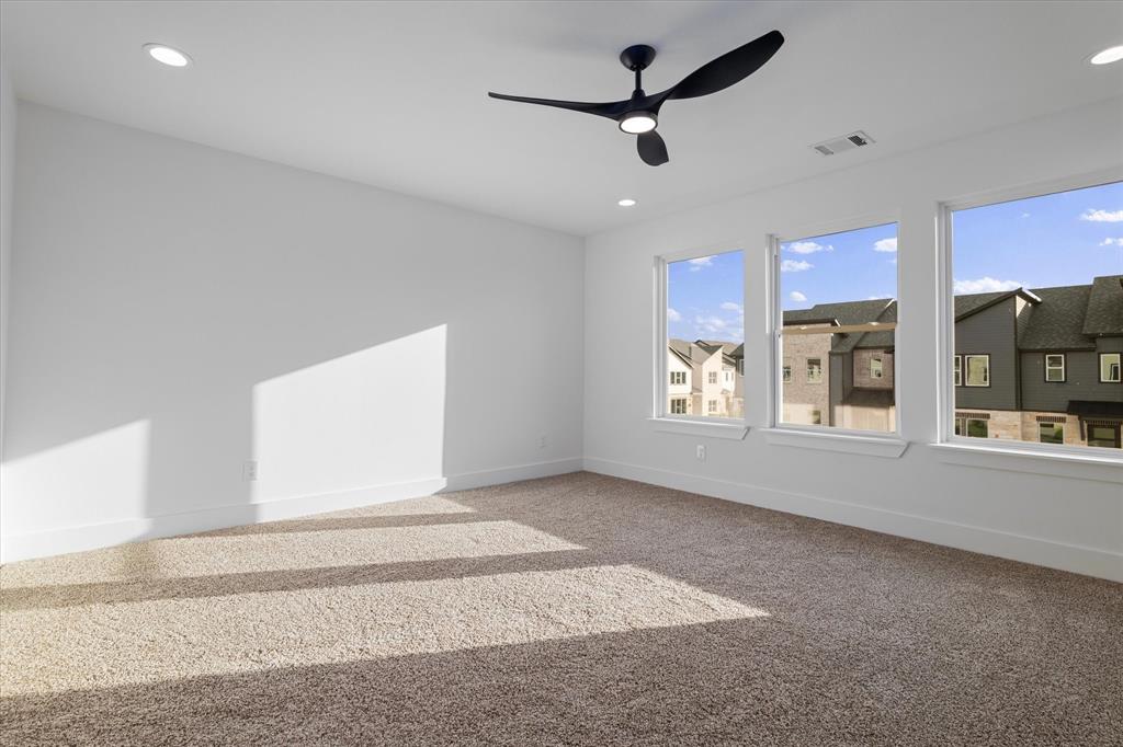 8918 Lowell Street Rowlett, TX 75089 - Photo 19 of 30 a view of an empty room with a window