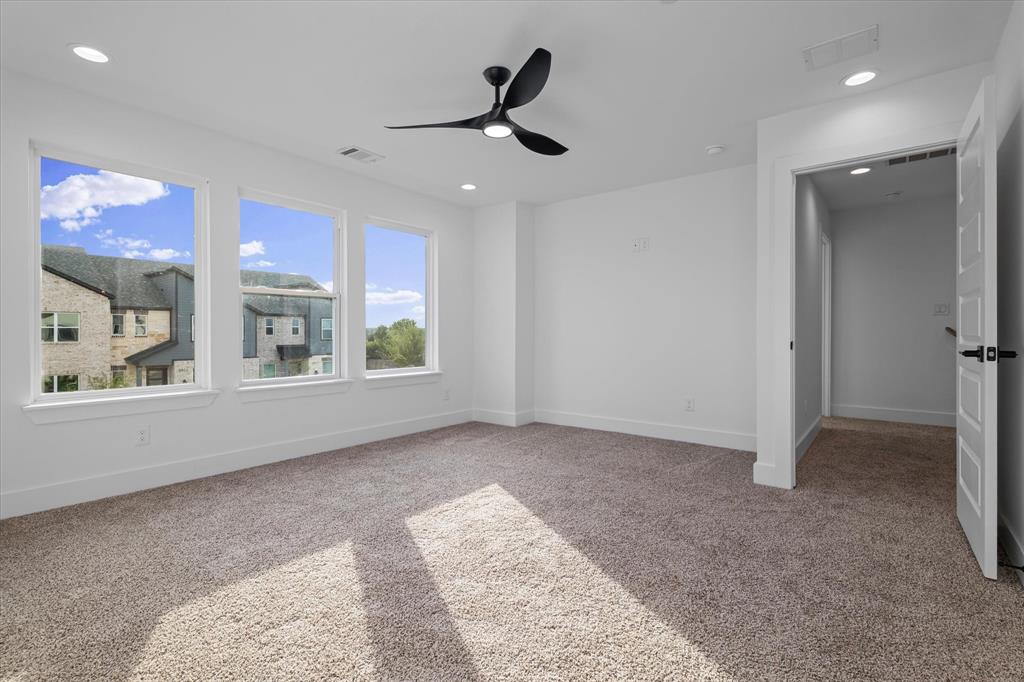 8918 Lowell Street Rowlett, TX 75089 - Photo 20 of 30 a view of an empty room with a window