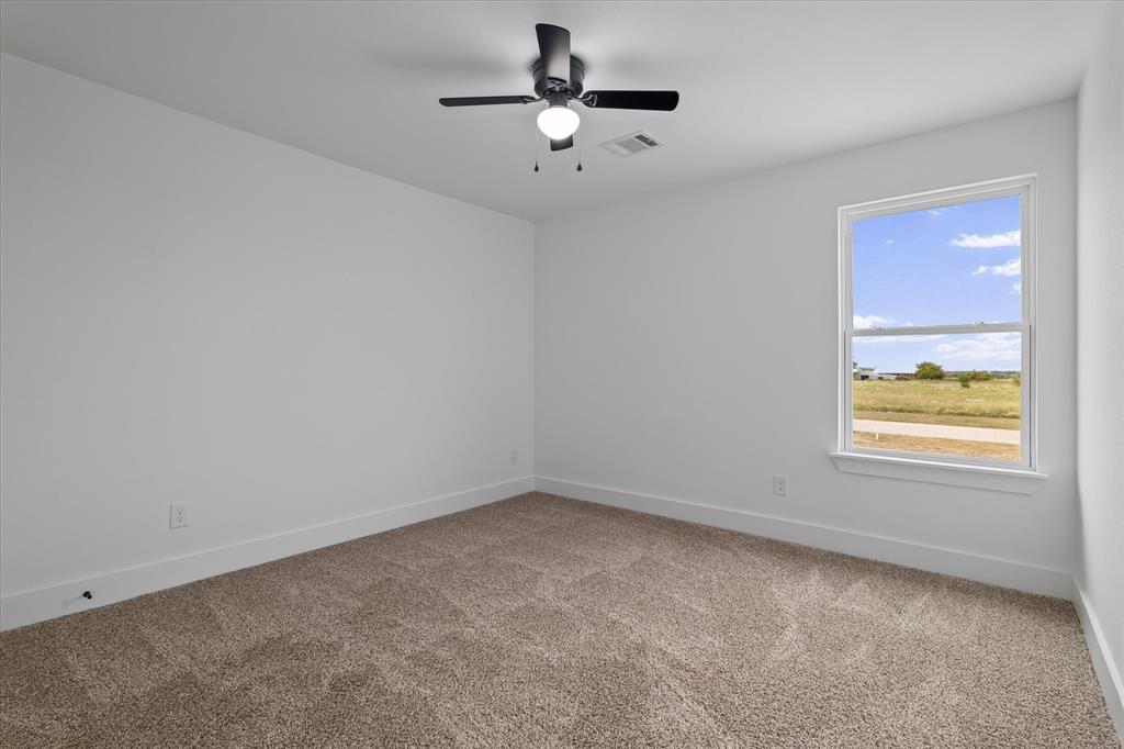 8918 Lowell Street Rowlett, TX 75089 - Photo 28 of 30 an empty room with a window
