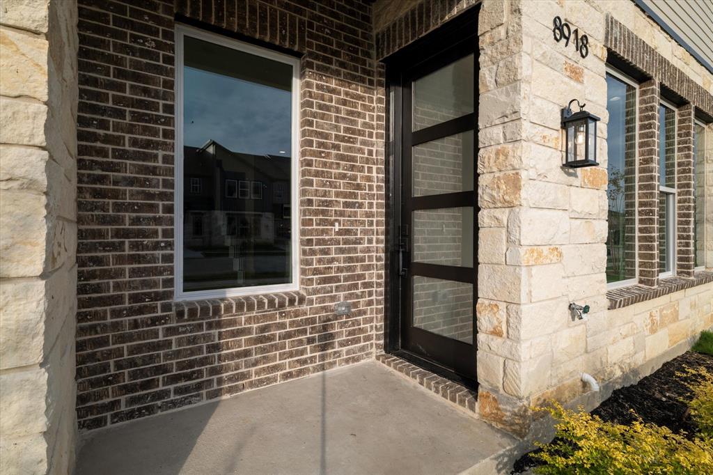 8918 Lowell Street Rowlett, TX 75089 - Photo 9 of 30 a view of a door of the house